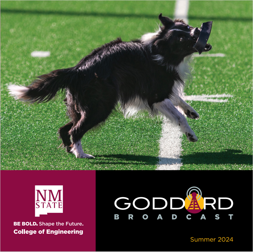 Dog running across a turf field carrying a black disc, with NM State College of Engineering and Goddard Broadcast Summer 2024 logos below.